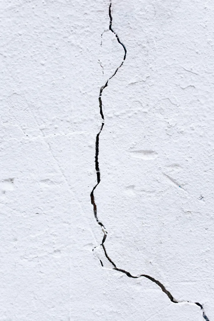 Crack in stucco wall.